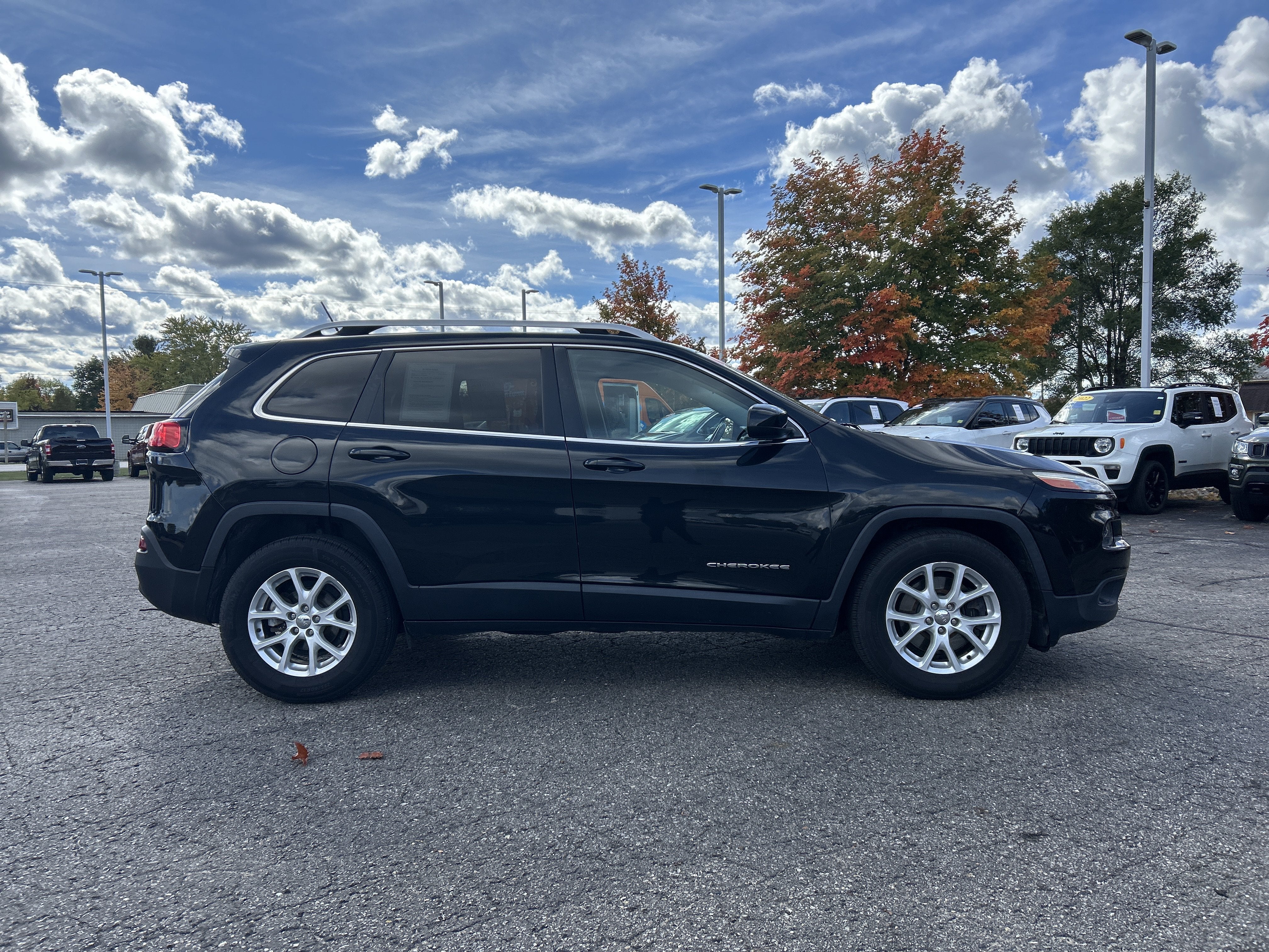 Used 2015 Jeep Cherokee Latitude with VIN 1C4PJLCB8FW661033 for sale in Kalkaska, MI