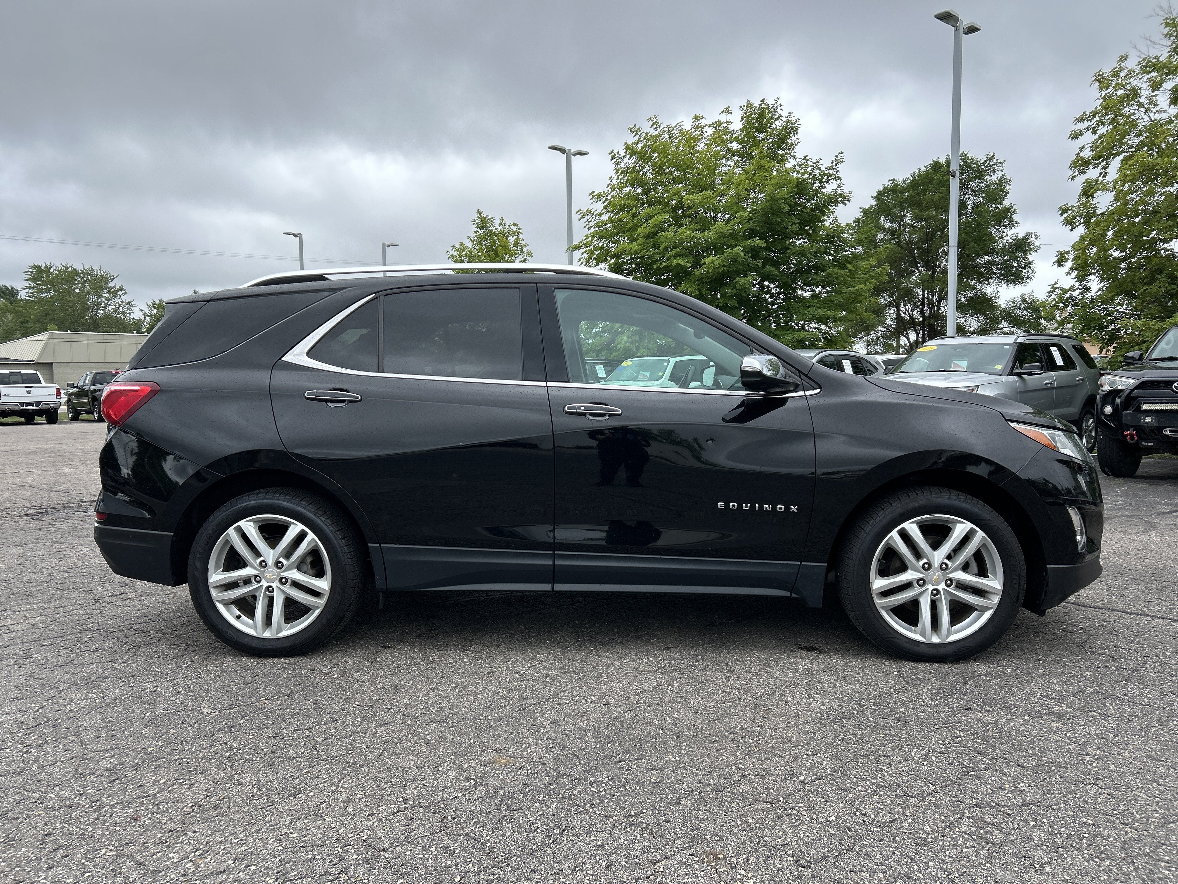Used 2020 Chevrolet Equinox Premier with VIN 2GNAXYEX0L6227857 for sale in Kalkaska, MI