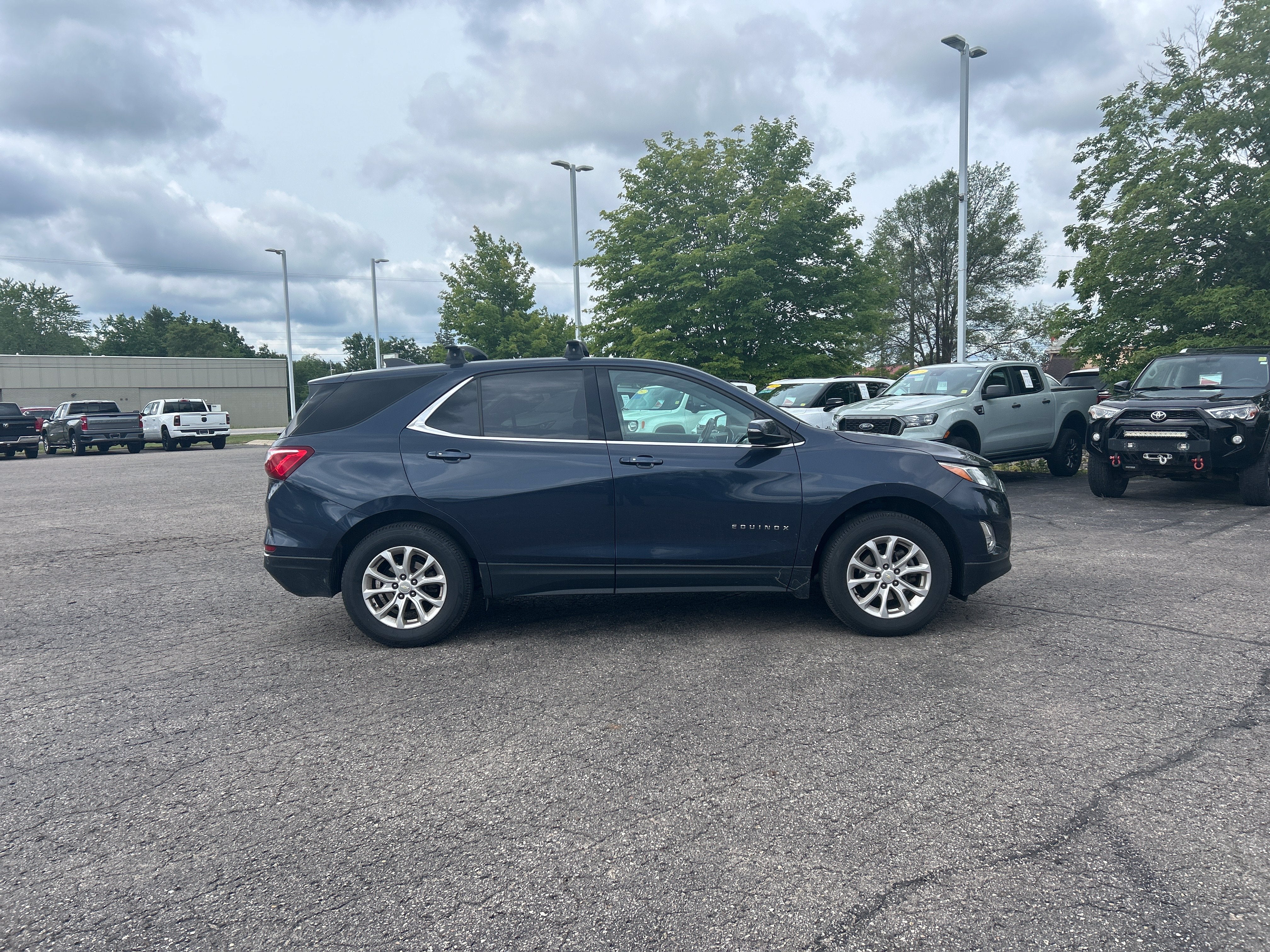 Used 2019 Chevrolet Equinox LT with VIN 3GNAXUEV6KL275655 for sale in Kalkaska, MI
