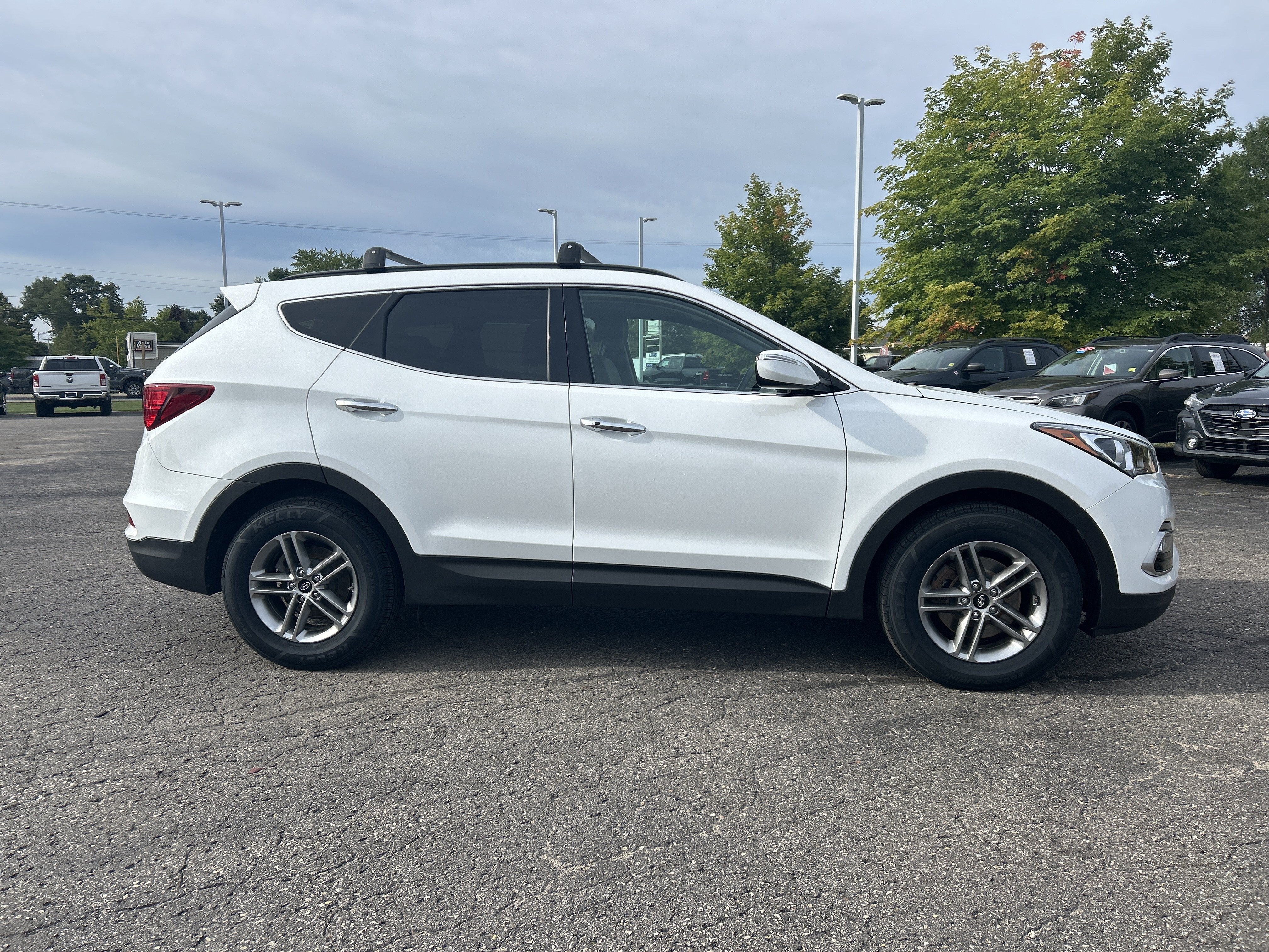 Used 2018 Hyundai Santa Fe Sport with VIN 5NMZUDLB2JH059312 for sale in Kalkaska, MI